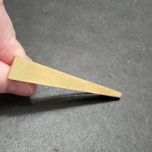 Marino gold tone triangular shaped brooch